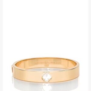 Kate spade gold hole punch spade hinge bangle